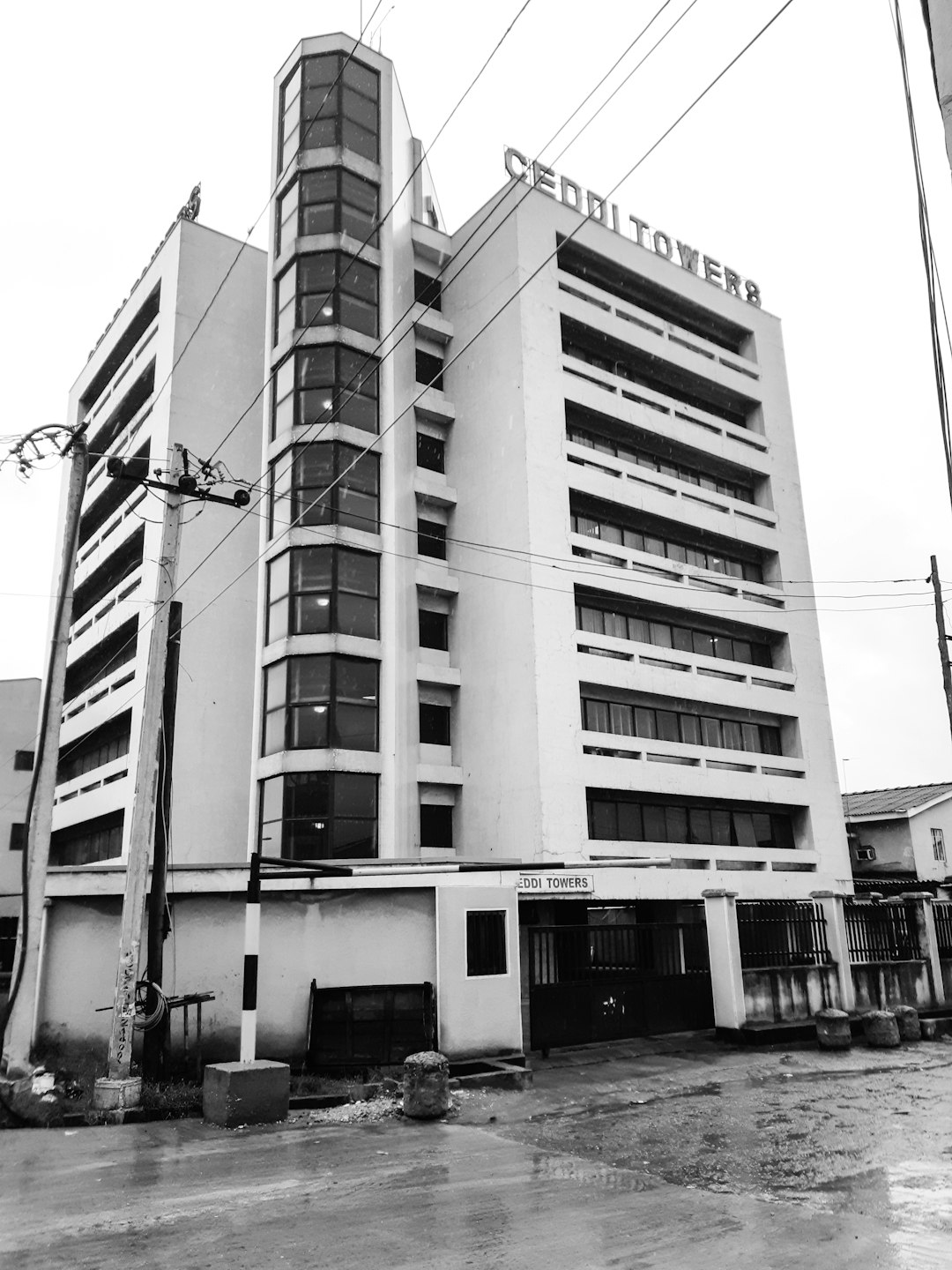 services-01 greyscale-photo-of-ceddi-towers-building-ip6vb-oroaq